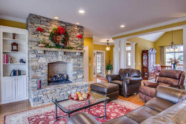 112 Revilo Road Leoma, TN 38468 - Photo 7 of 20 Inviting den with stone fireplace and built-ins.