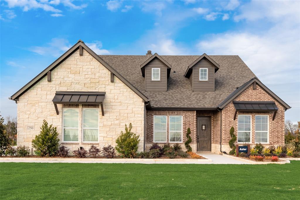 250 Brown Road Leonard, TX 75452 - Photo 1 of 29 Stone and brick exterior with dark trim accents, multiple gables, and dormer windows
