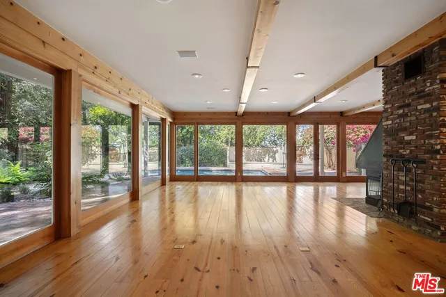 a kitchen with a table chairs and a stove