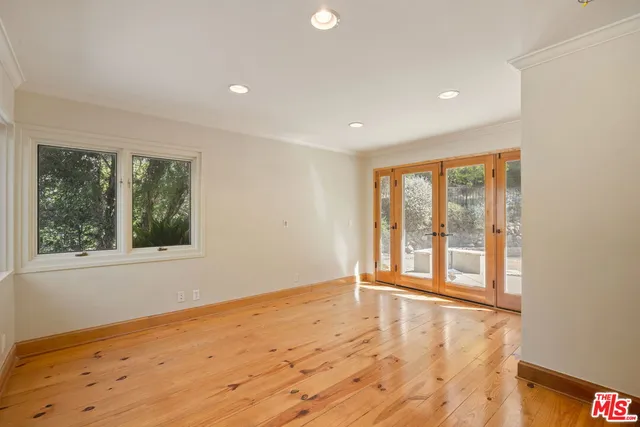 a view of a room with a large window