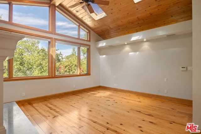 a bathroom with a tub and shower