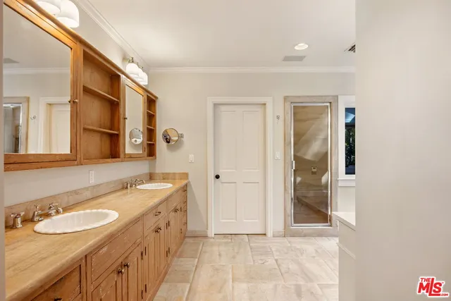 an empty room with windows and entrance