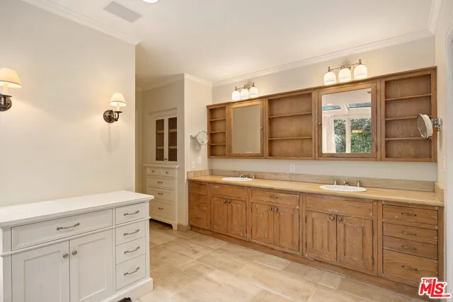a view of a hallway view with wooden floor and staircase