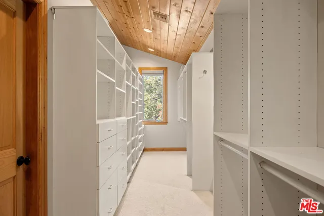 a room with a bed and a window