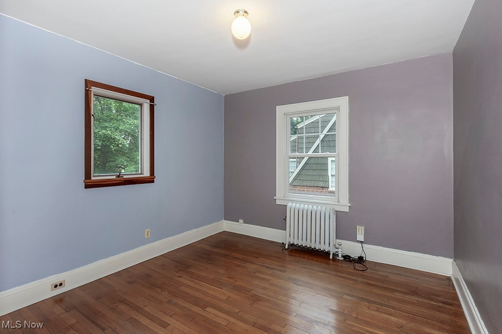 2602 Exeter Road Cleveland, OH 44118 - Photo 30 of 40 Fourth bedroom with hardwood floors and built ins.