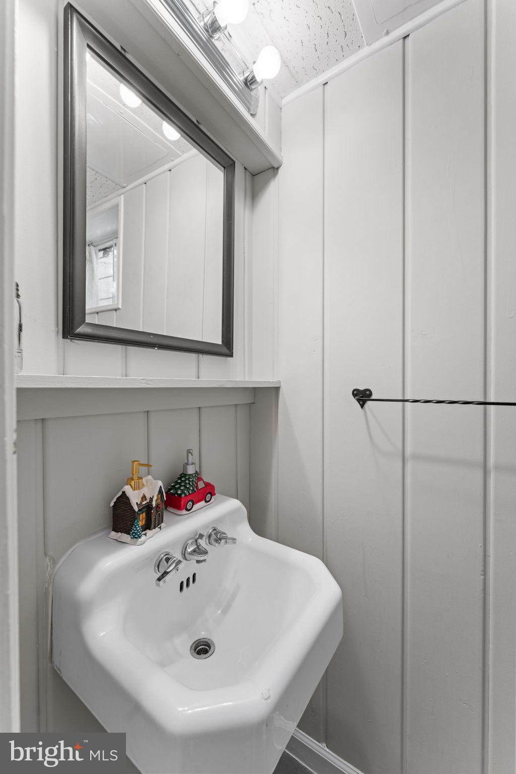 5121 Baltan Road Bethesda, MD 20816 - Photo 64 of 90 Charming half-bath with modern flair.