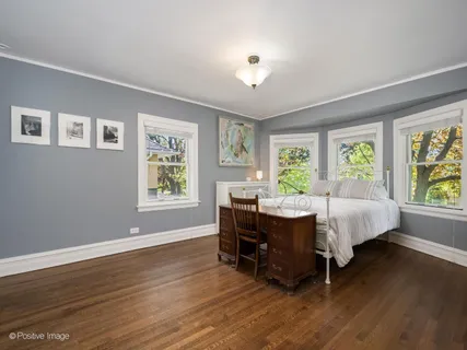 a bed room with a bed and a table