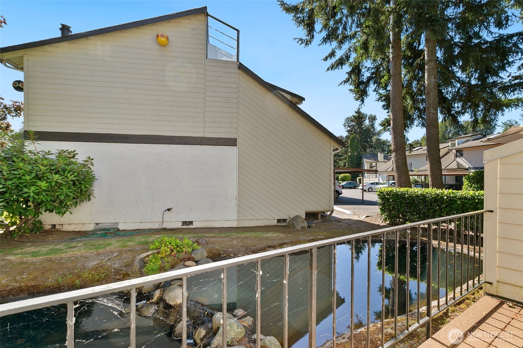 1802 Maple Lane, Unit A5 Kent, WA 98030 - Photo 20 of 27 a view of a house with backyard and trees