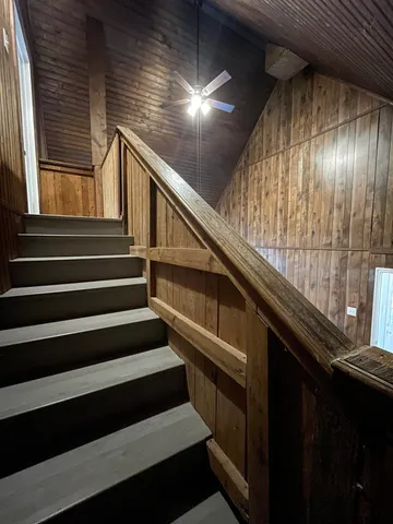a view of wooden floor and staircase