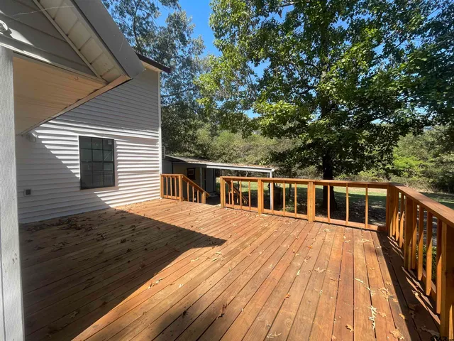 a view of outdoor space with trees all around