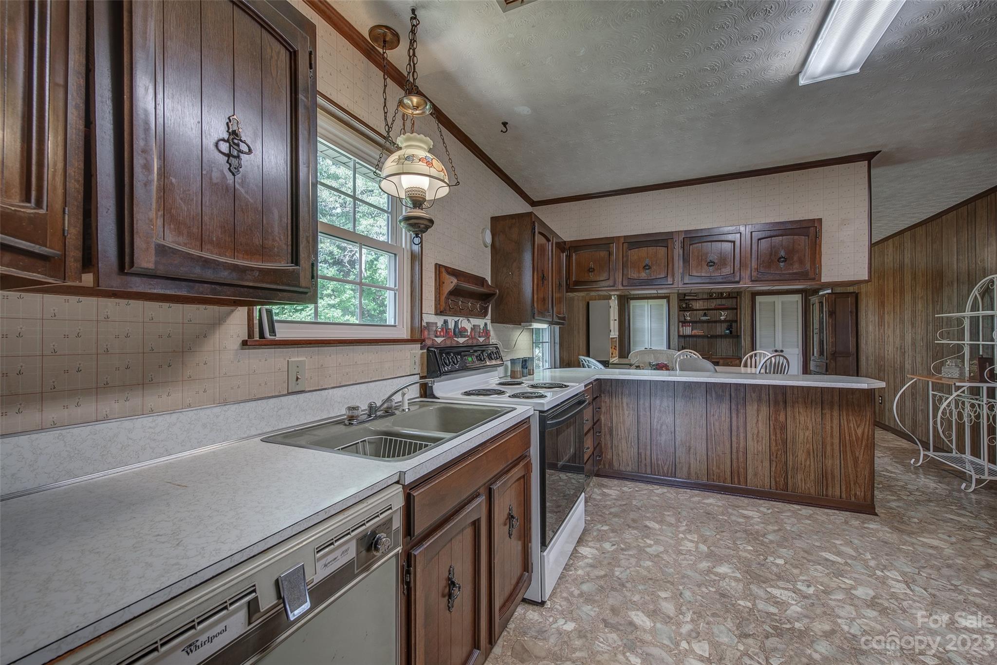 2141 New Prospect Church Road Shelby, NC 28150 - Photo 13 of 43 a kitchen with a sink and cabinets