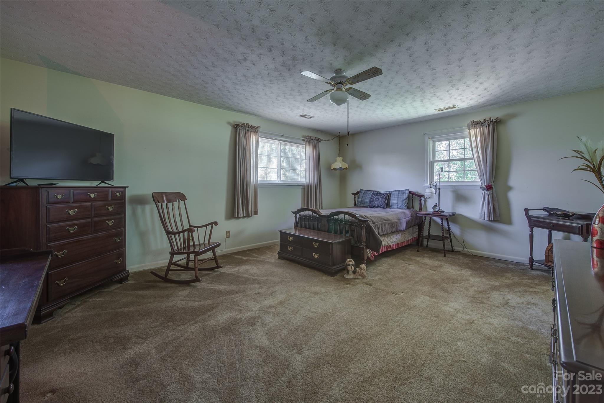 2141 New Prospect Church Road Shelby, NC 28150 - Photo 15 of 43 a living room with furniture a window and a flat screen tv