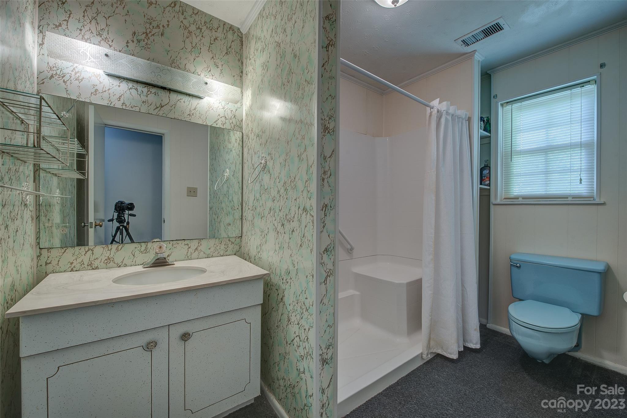 2141 New Prospect Church Road Shelby, NC 28150 - Photo 16 of 43 a bathroom with a sink toilet and shower