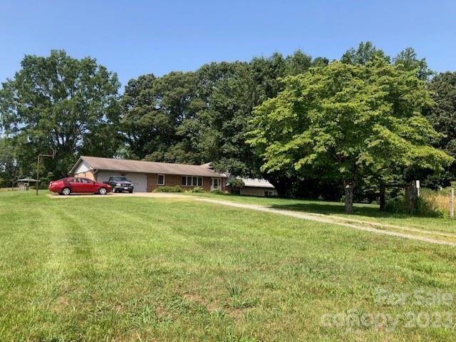 2141 New Prospect Church Road Shelby, NC 28150 - Photo 2 of 43 a view of a house with a big yard