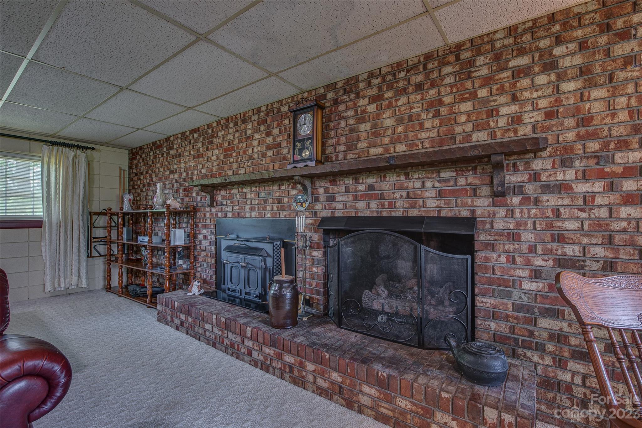 2141 New Prospect Church Road Shelby, NC 28150 - Photo 22 of 43 a room with fireplace and a couch