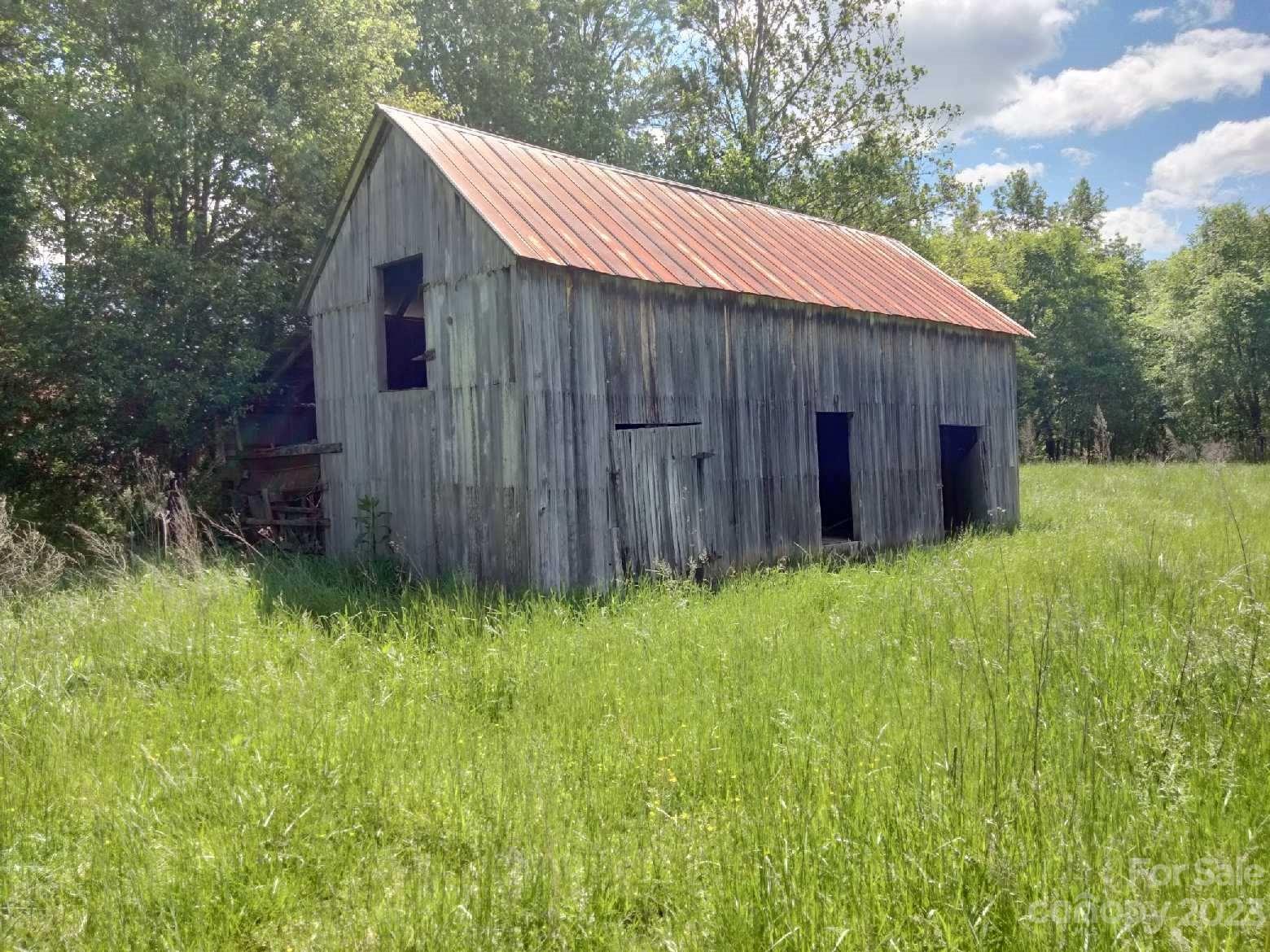 2141 New Prospect Church Road Shelby, NC 28150 - Photo 25 of 43 a backyard of a house with lots of green space