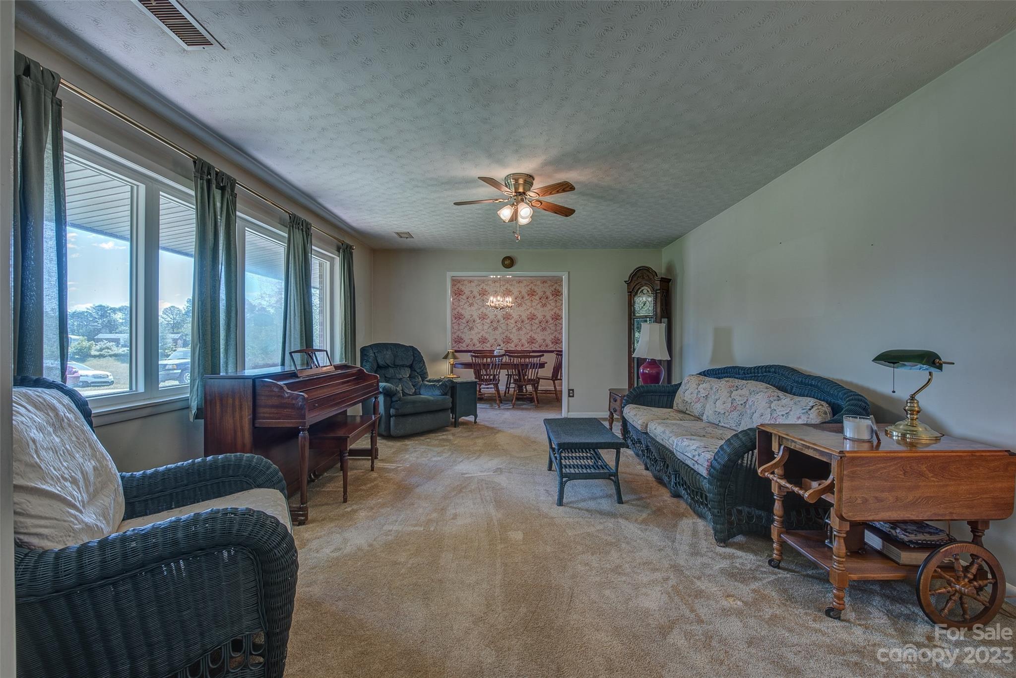 2141 New Prospect Church Road Shelby, NC 28150 - Photo 5 of 43 a living room with furniture and a chandelier