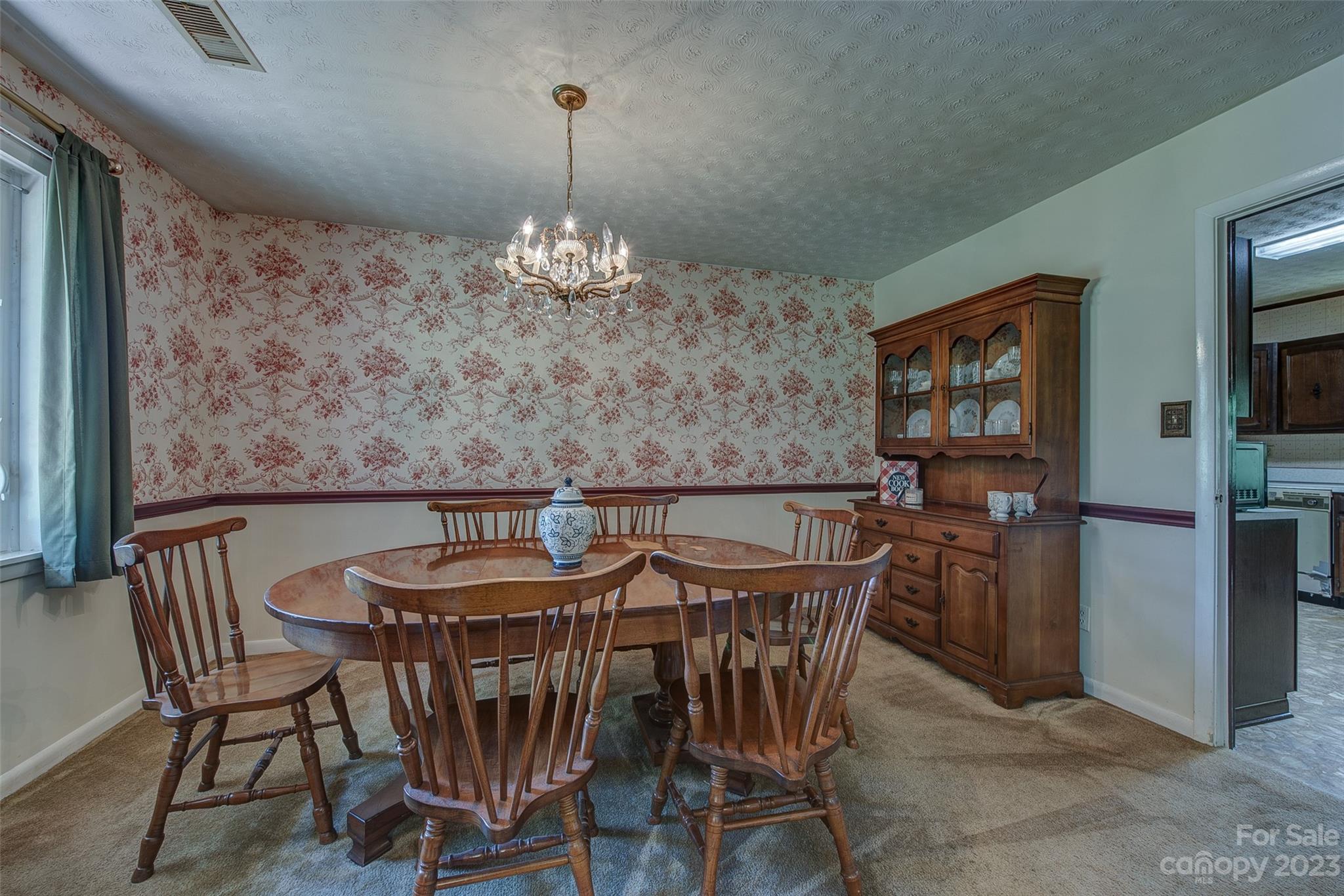 2141 New Prospect Church Road Shelby, NC 28150 - Photo 7 of 43 a view of a dining room with furniture and chandelier