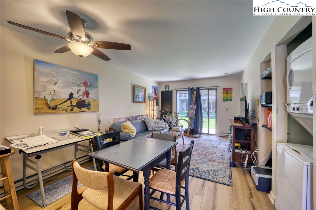 128 Zeb Street, Unit A106 Boone, NC 28607 - Photo 5 of 22 a view of a livingroom with furniture and a table