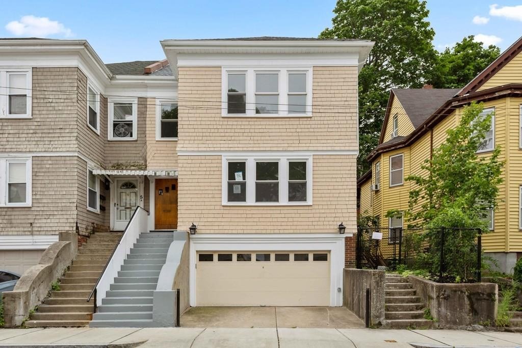 5 Greenheys Street, Unit 2 Boston, MA 02121 - Photo 10 of 10 a front view of a house with a yard
