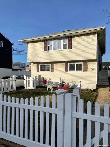 a front view of a house with a porch