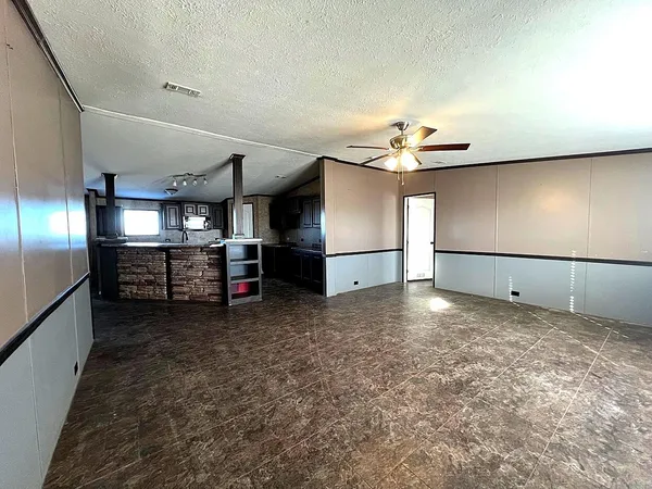 a view of a livingroom with an empty space