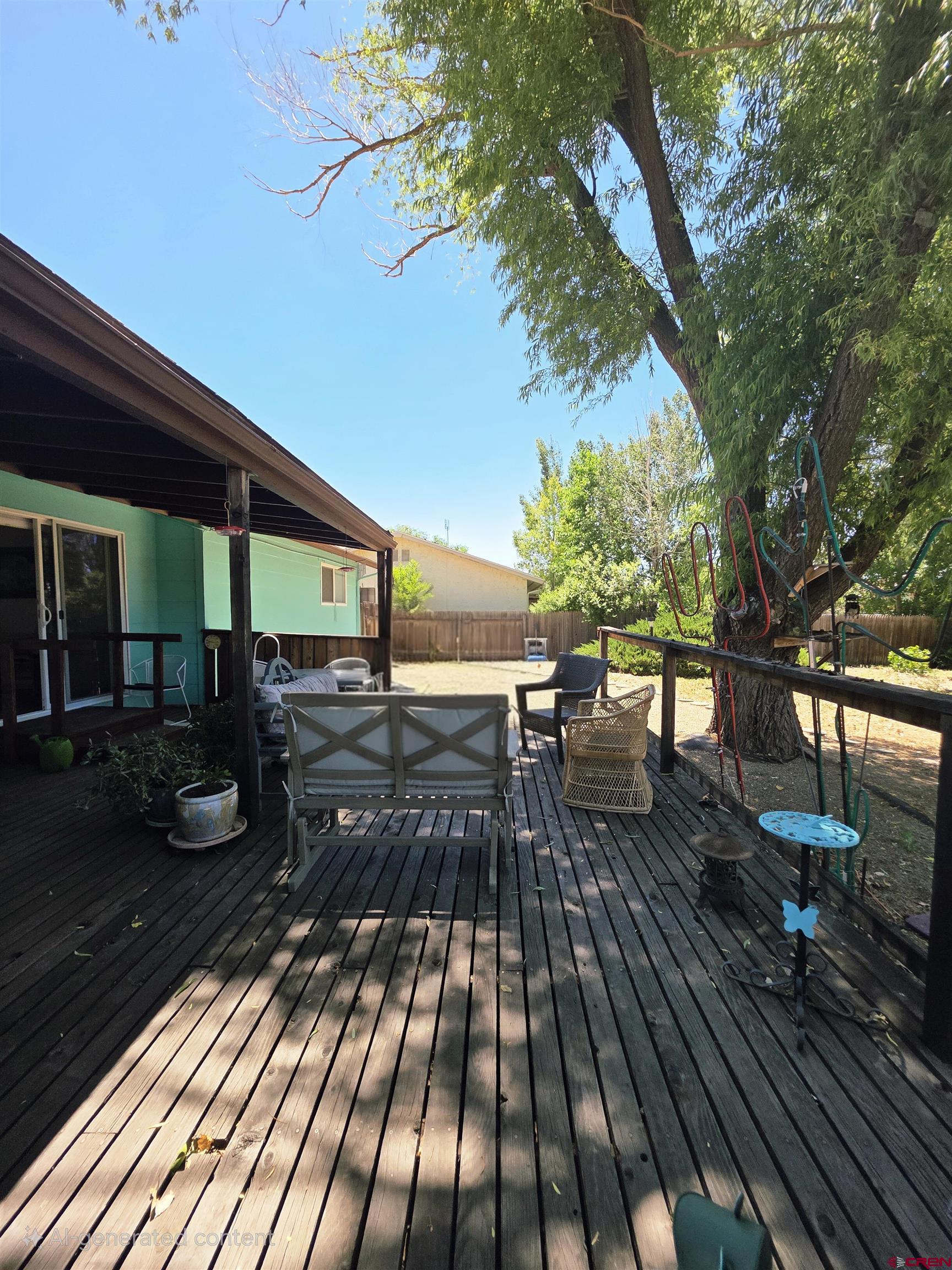 613 Colorado Street Cortez, CO 81321 - Photo 12 of 19 an outdoor space with seating