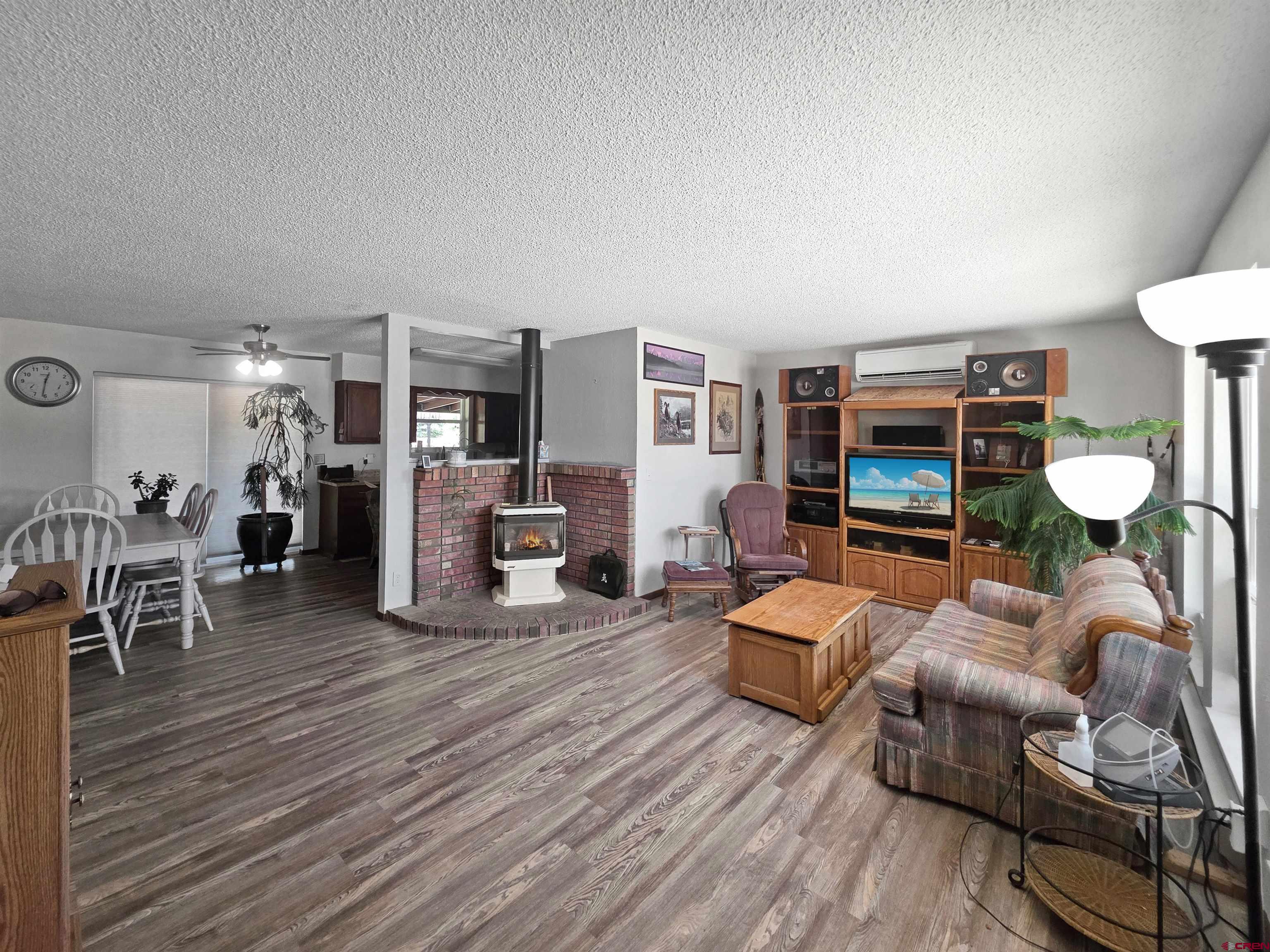 613 Colorado Street Cortez, CO 81321 - Photo 18 of 19 a living room with furniture and a wooden floor