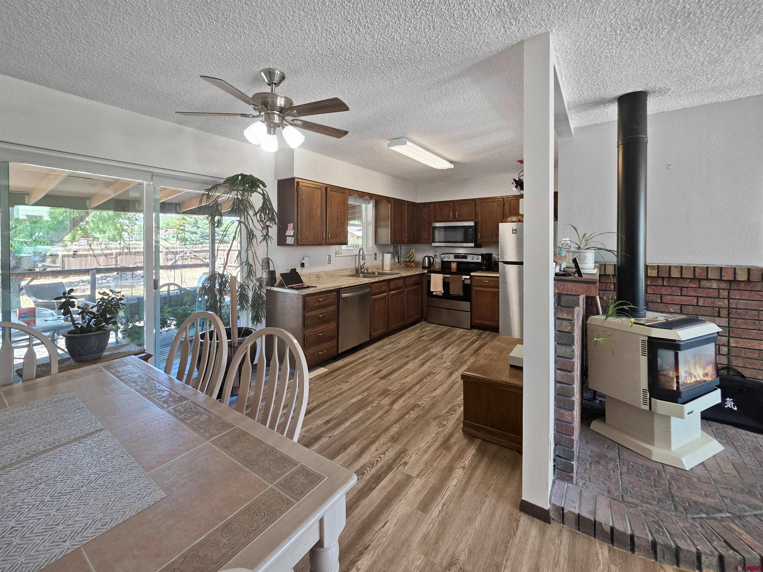 613 Colorado Street Cortez, CO 81321 - Photo 7 of 19 a view of a dining room with furniture window and outside view