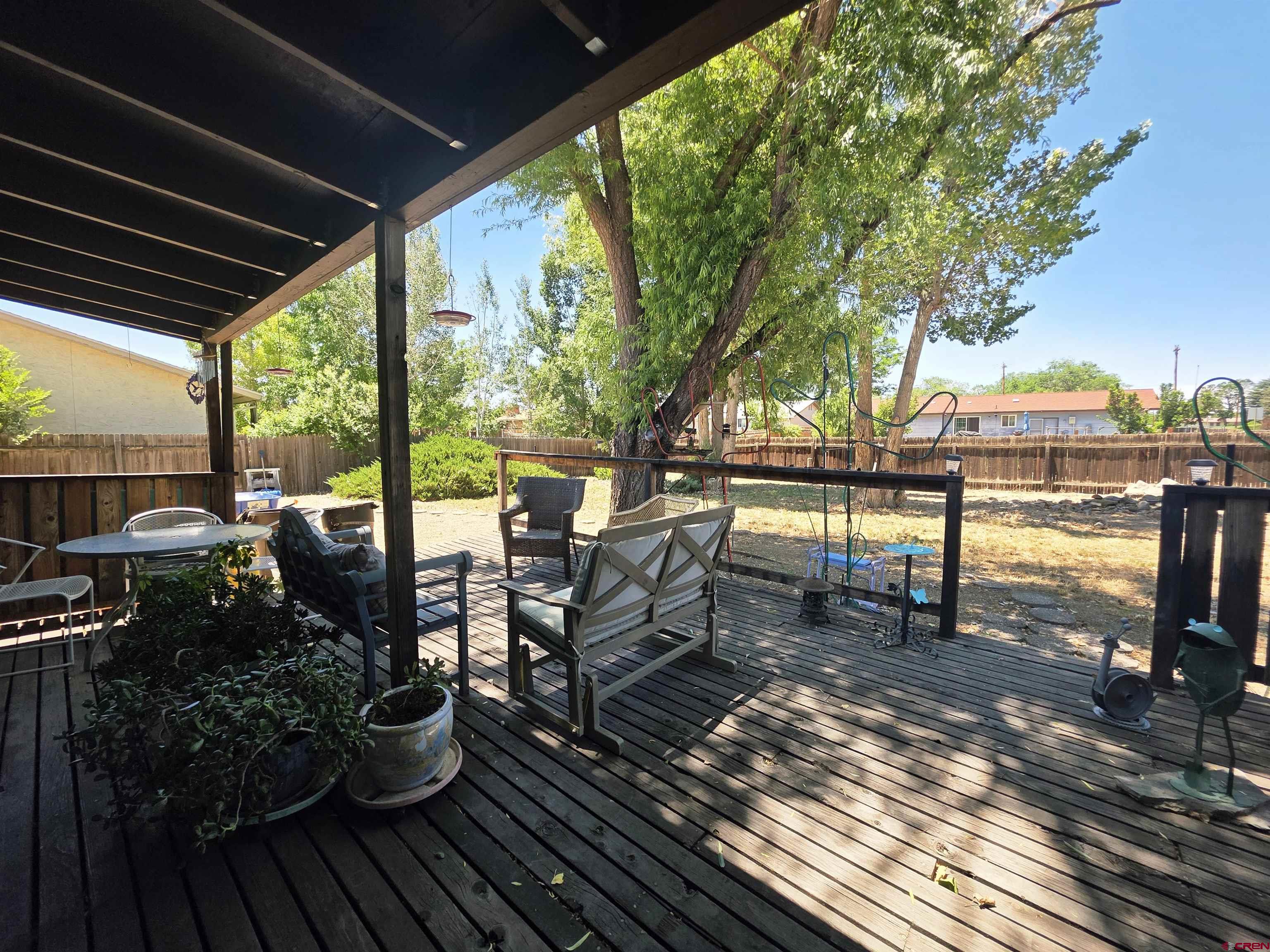 613 Colorado Street Cortez, CO 81321 - Photo 10 of 19 a view of a chairs and tables in the balcony