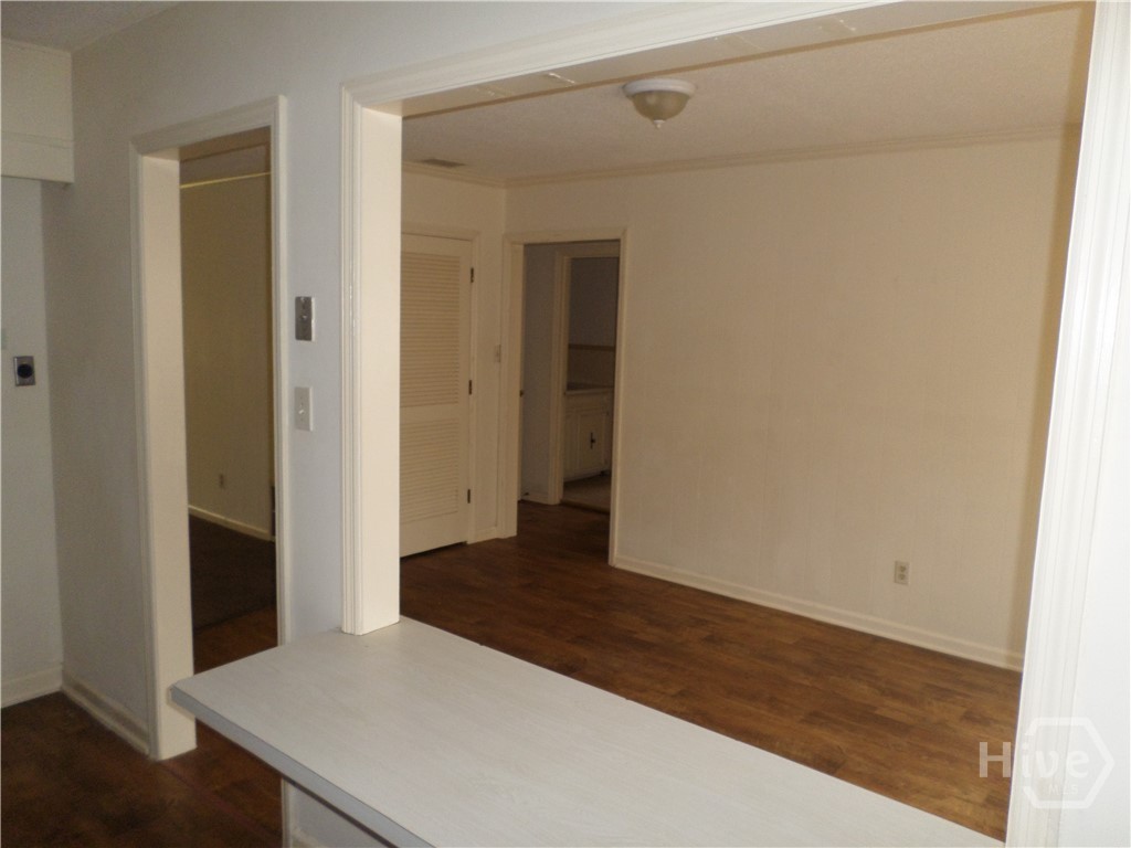203 West 58th Street Savannah, GA 31405 - Photo 7 of 18 Pass thru to dining room