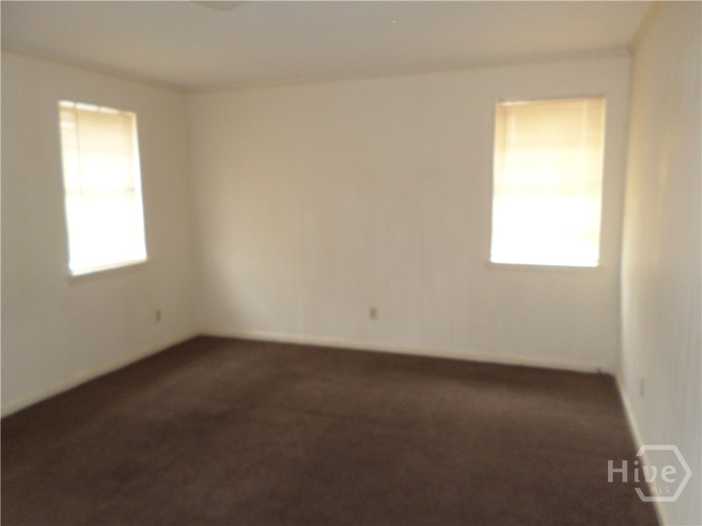 203 West 58th Street Savannah, GA 31405 - Photo 10 of 18 Master bedroom