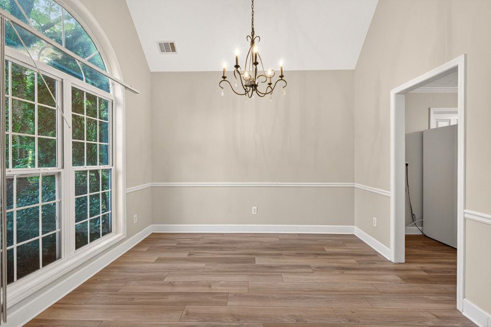 4035 Lakeside Boulevard Monroe, GA 30655 - Photo 12 of 43 a view of empty room with wooden floor and fan