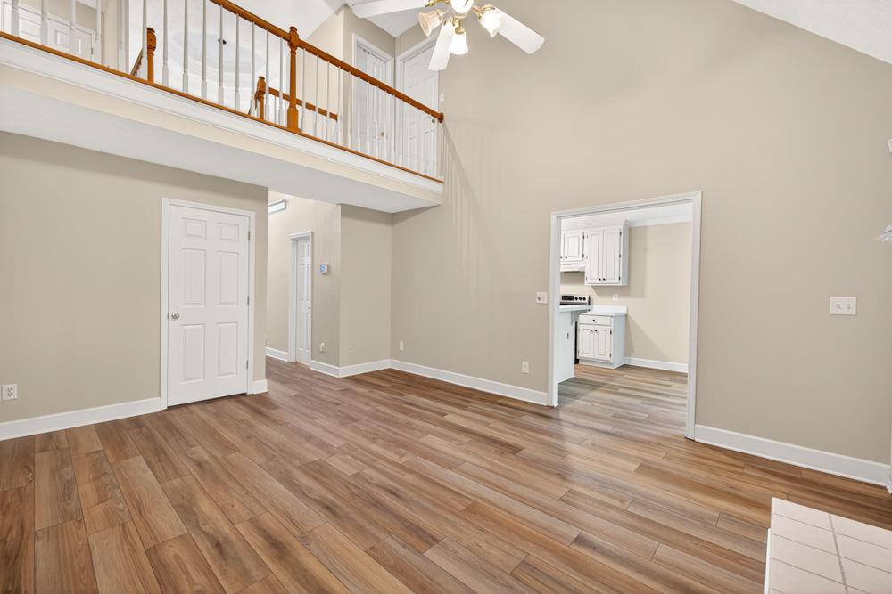 4035 Lakeside Boulevard Monroe, GA 30655 - Photo 17 of 43 a view of empty room with wooden floor