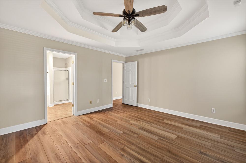 4035 Lakeside Boulevard Monroe, GA 30655 - Photo 18 of 43 a view of empty room with wooden floor