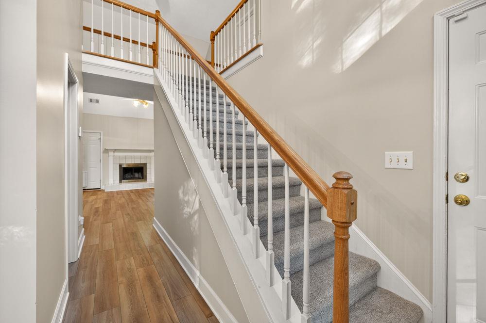 4035 Lakeside Boulevard Monroe, GA 30655 - Photo 26 of 43 a view of entryway and hall with wooden floor
