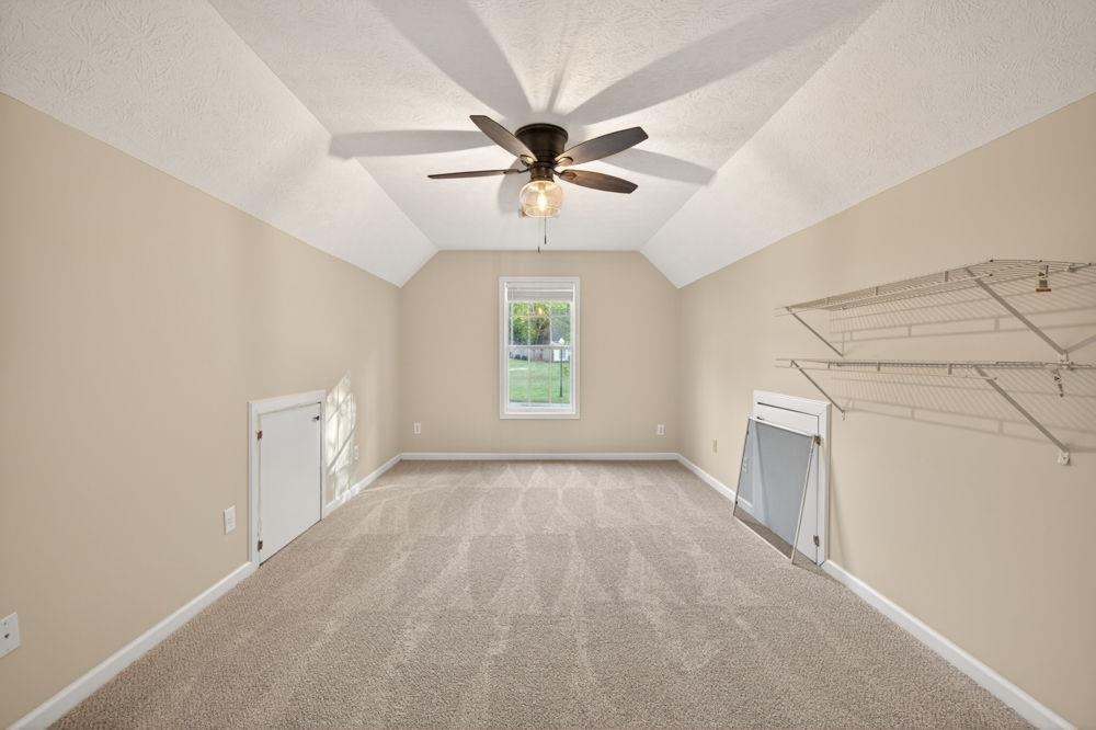 4035 Lakeside Boulevard Monroe, GA 30655 - Photo 30 of 43 an empty room with windows and fan