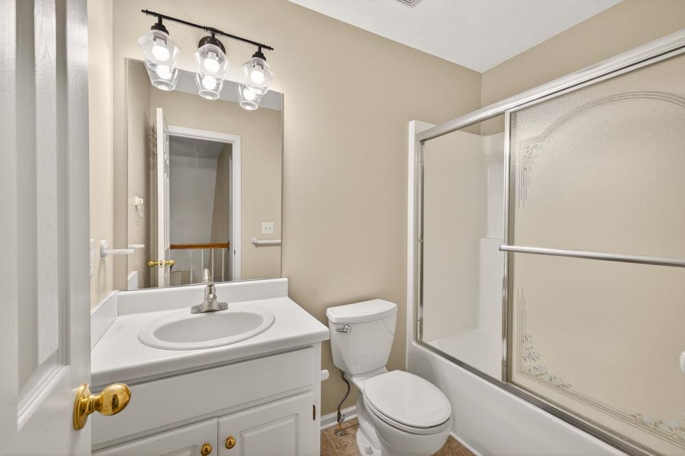 4035 Lakeside Boulevard Monroe, GA 30655 - Photo 33 of 43 a bathroom with a sink toilet and shower