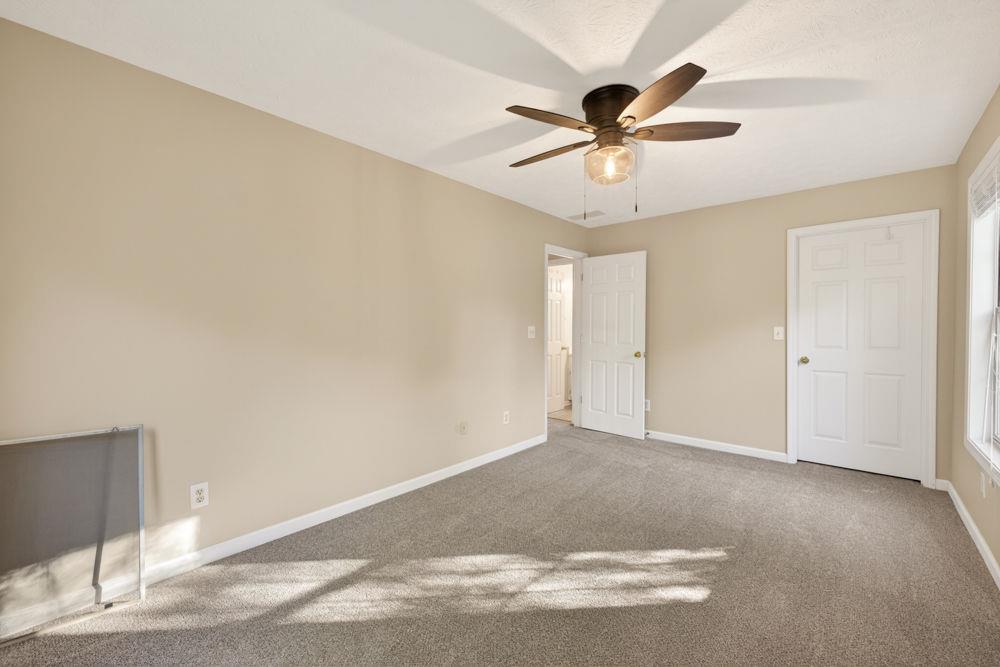 4035 Lakeside Boulevard Monroe, GA 30655 - Photo 35 of 43 a view of a big room with wooden floor and windows in a room