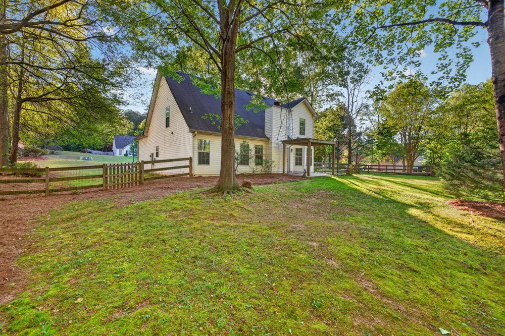 4035 Lakeside Boulevard Monroe, GA 30655 - Photo 36 of 43 a view of a house with a yard and sitting area