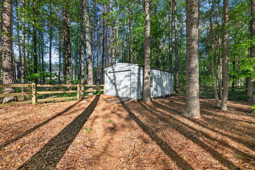 4035 Lakeside Boulevard Monroe, GA 30655 - Photo 39 of 43 a view of a backyard with trees