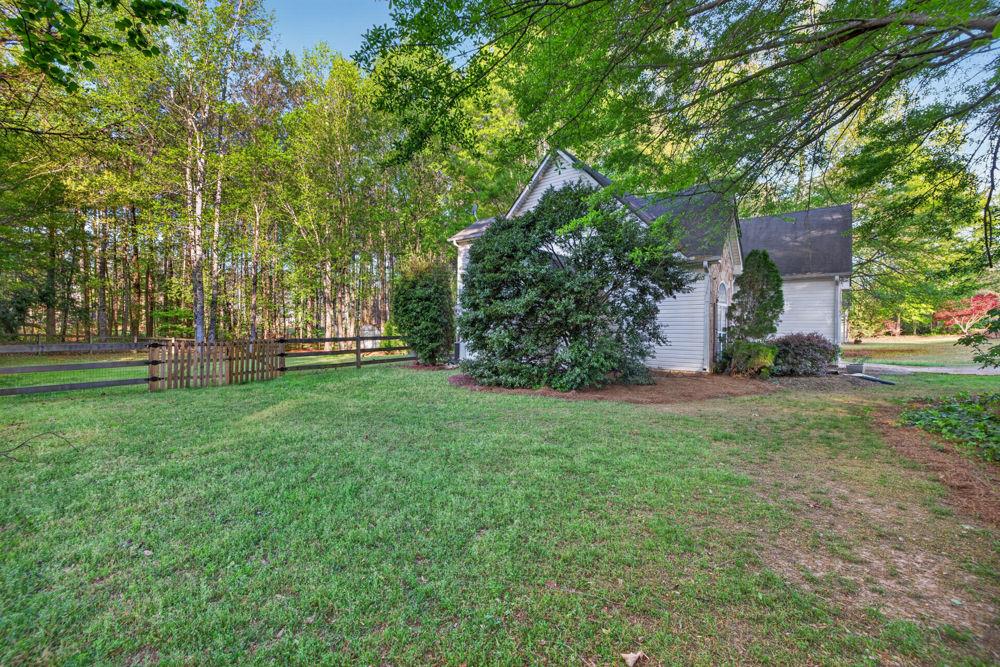4035 Lakeside Boulevard Monroe, GA 30655 - Photo 10 of 43 a view of a park with large trees