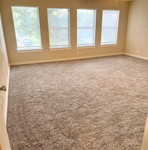 an empty room with window