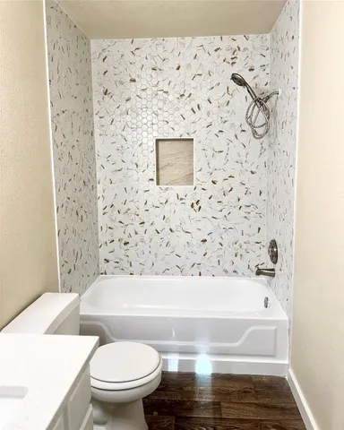 a bathroom with a sink and a bathtub