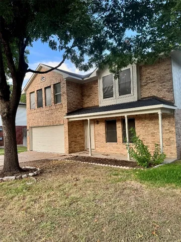 a view of a backyard with a trampoline