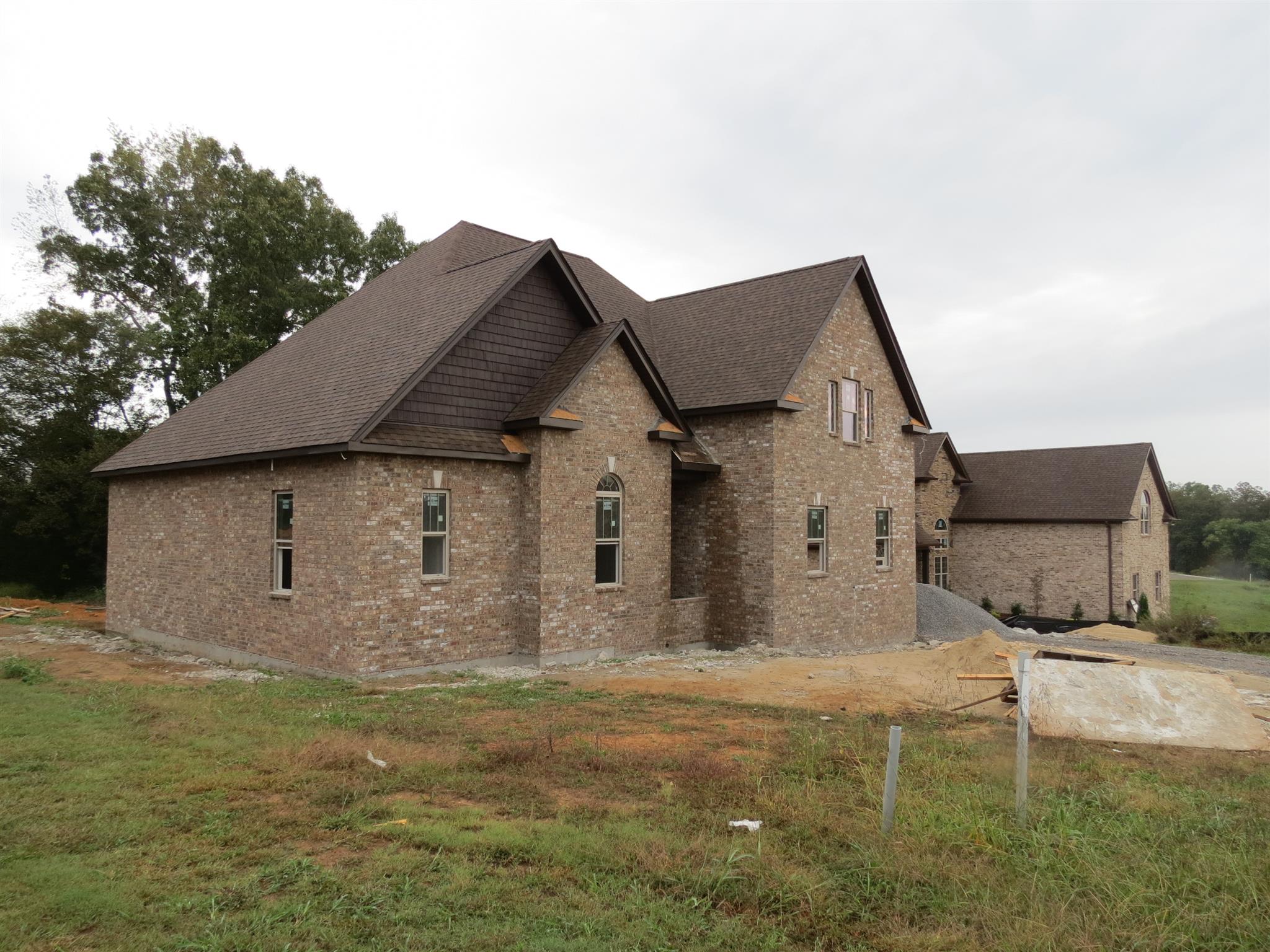 55 Harbor Pointe Lebanon, TN 37087 - Photo 3 of 29 a view of a big house with wooden fence