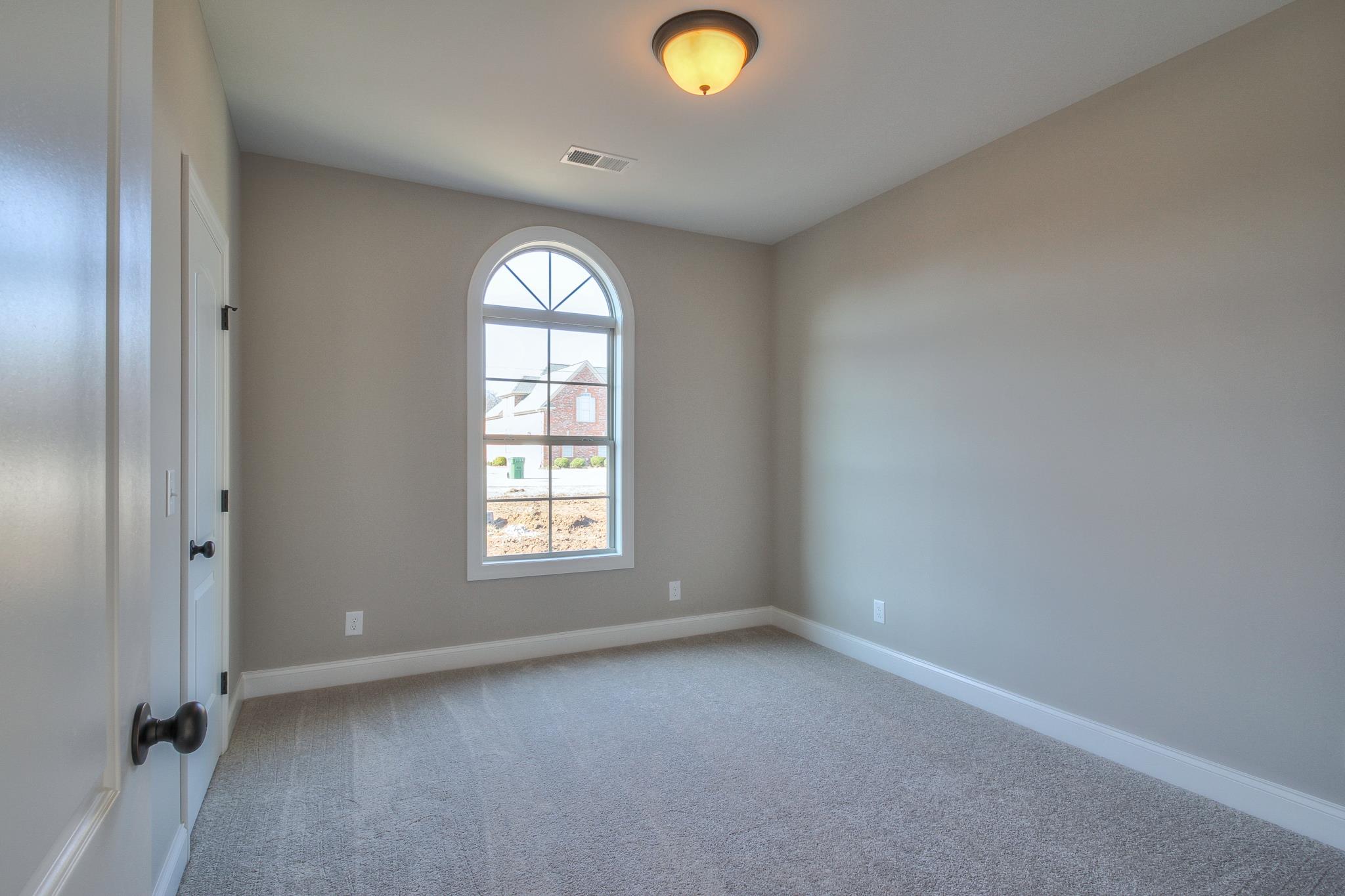 55 Harbor Pointe Lebanon, TN 37087 - Photo 23 of 29 an empty room with windows and closet
