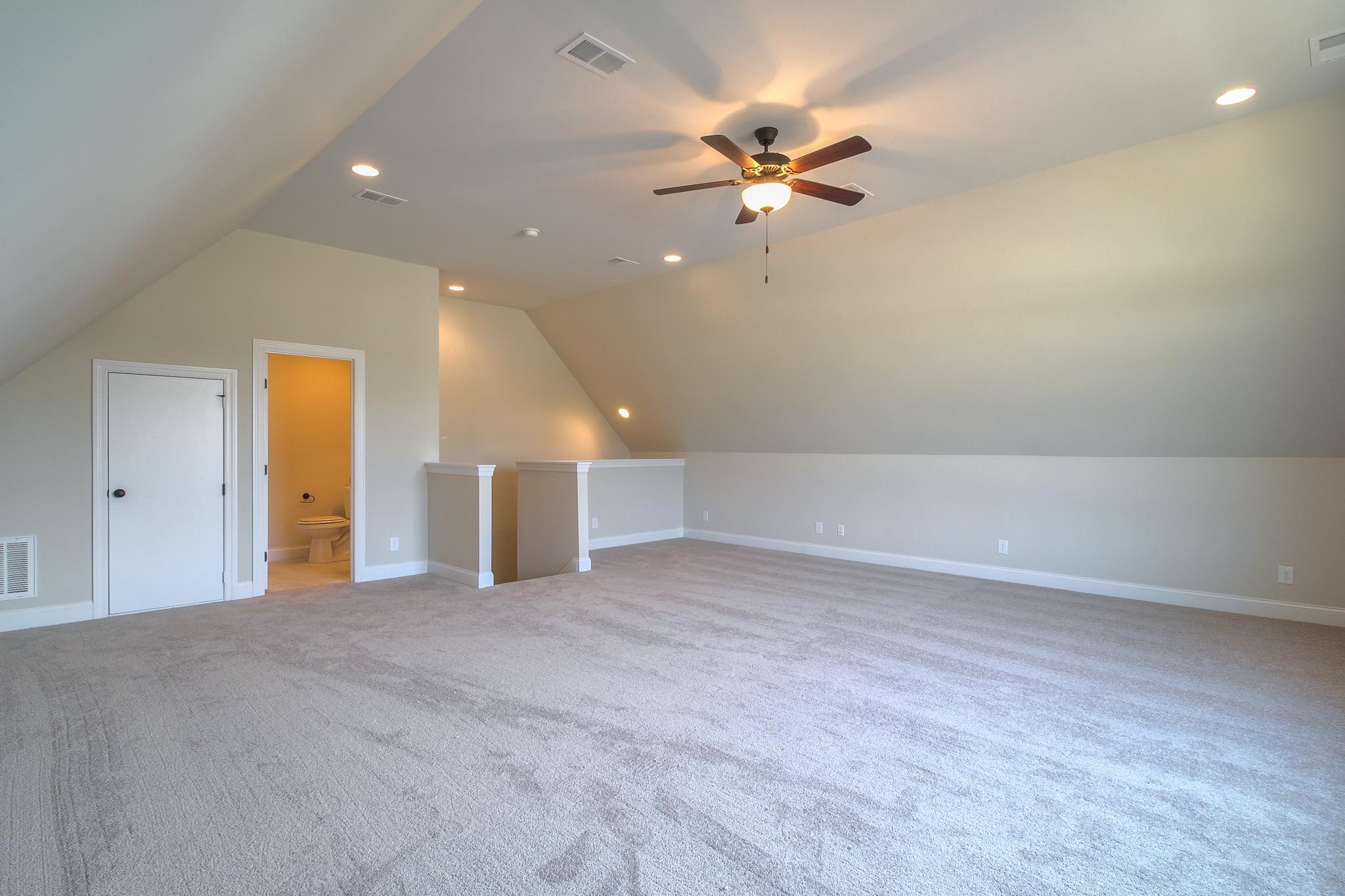 55 Harbor Pointe Lebanon, TN 37087 - Photo 27 of 29 a view of an empty room with a chandelier fan