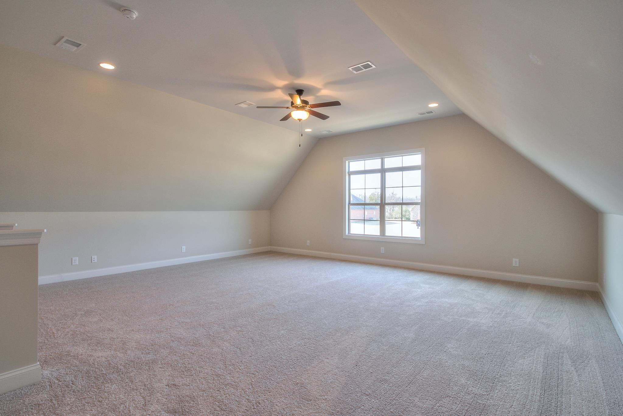 55 Harbor Pointe Lebanon, TN 37087 - Photo 28 of 29 an empty room with windows and ceiling fan