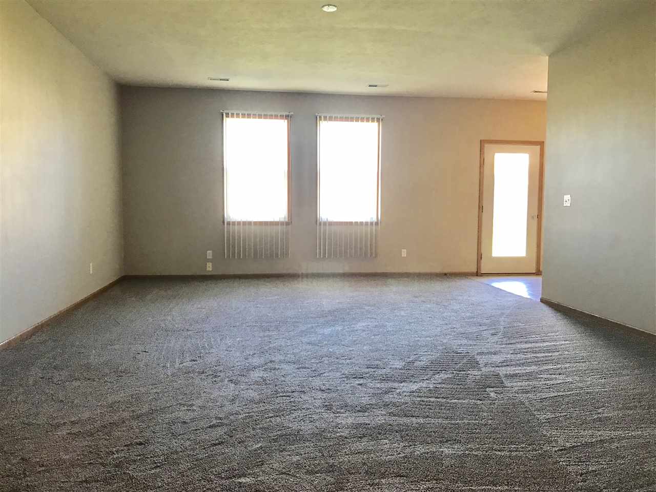 15634 Stonecrest Road South Beloit, IL 61080 - Photo 3 of 15 an empty room with windows